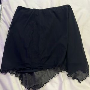 Black mini skirt with mesh sheet on top. Cute and pretty